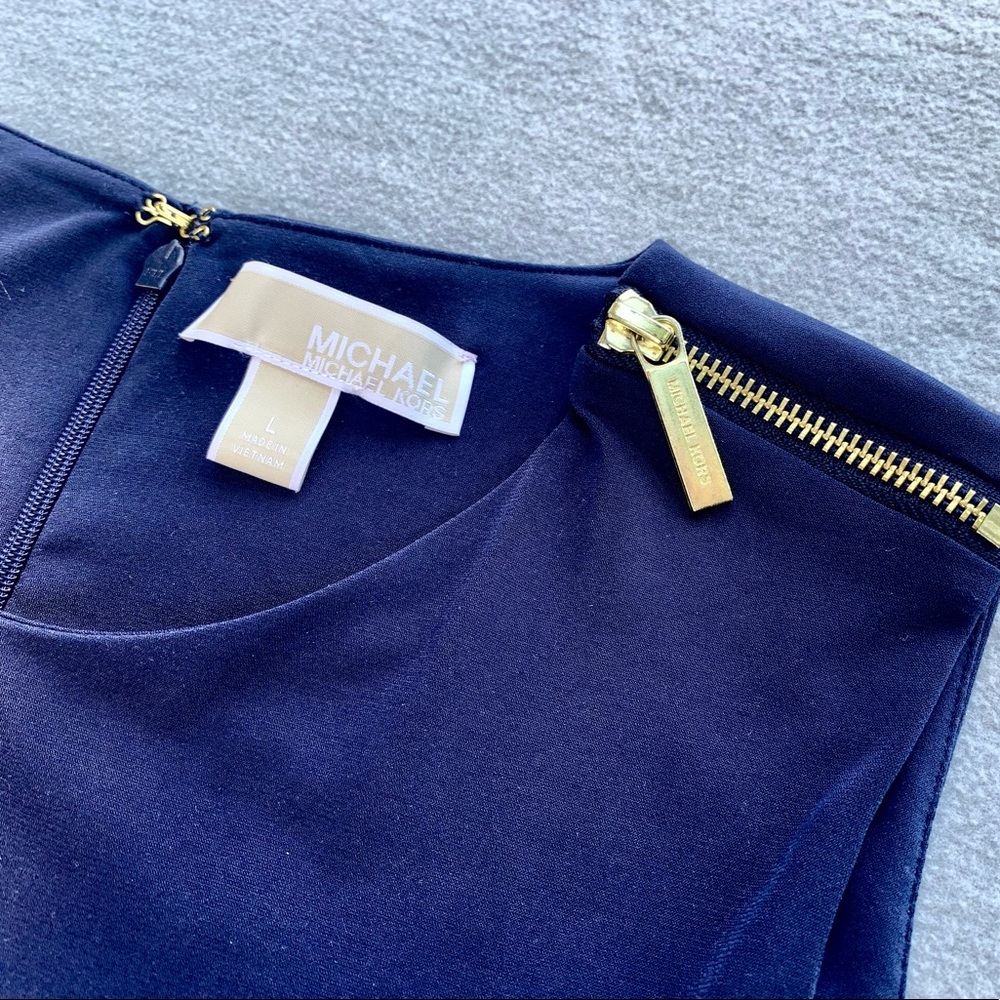Michael Kors blue jumpsuit with gold details